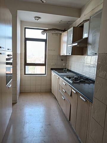 Kitchen in 3 BHK Apartment at Tarun CGHS, Sector 47 – for Rent