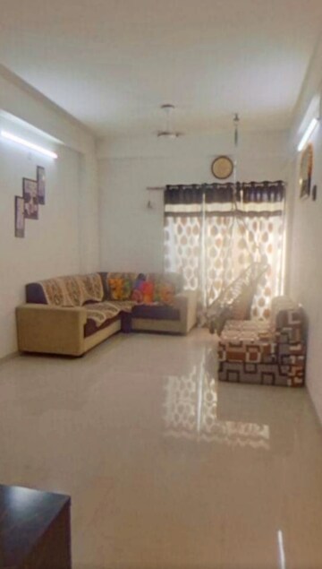 Living Room in 1 BHK Apartment at Adani Shantigram Aangan, Near Vaishno Devi Circle On Sg Highway – for Rent