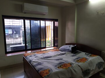 Bedroom in 2 BHK Apartment at Anushka CHS, Andheri West – for Rent
