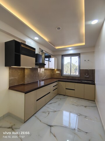 Kitchen in 4 BHK Apartment at Mansarovar – for Sale