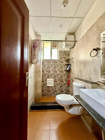 Attached Bathroom in 3 BHK Apartment at Sushma Crescent, Dhakoli Village – for Sale