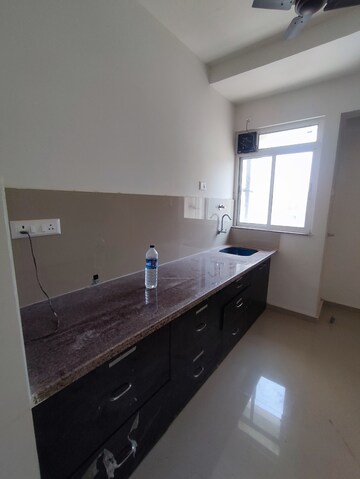 Kitchen in 1 BHK Apartment at Puranik Hometown, Ghodbunder Road – for Rent