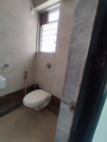 Bathroom in 1 BHK Apartment at Raunak Bliss, Ghodbunder Road – for Rent