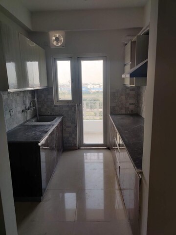 Kitchen in 2 BHK Apartment at Nirala Greenshire, Sector 2 Greater Noida – for Rent