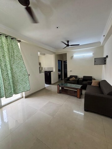 Living Room in 2 BHK Apartment at Amrapali Silicon City, Sector 76 – for Rent