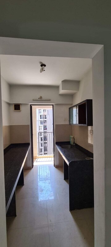 Kitchen in 1 BHK Apartment at Lodha Palava City Lakeshore Greens, Dombivli East – for Rent