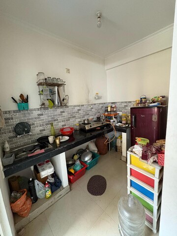 Kitchen in 1 BHK Apartment at Nilaya Greens, Raj Nagar Extension – for Rent