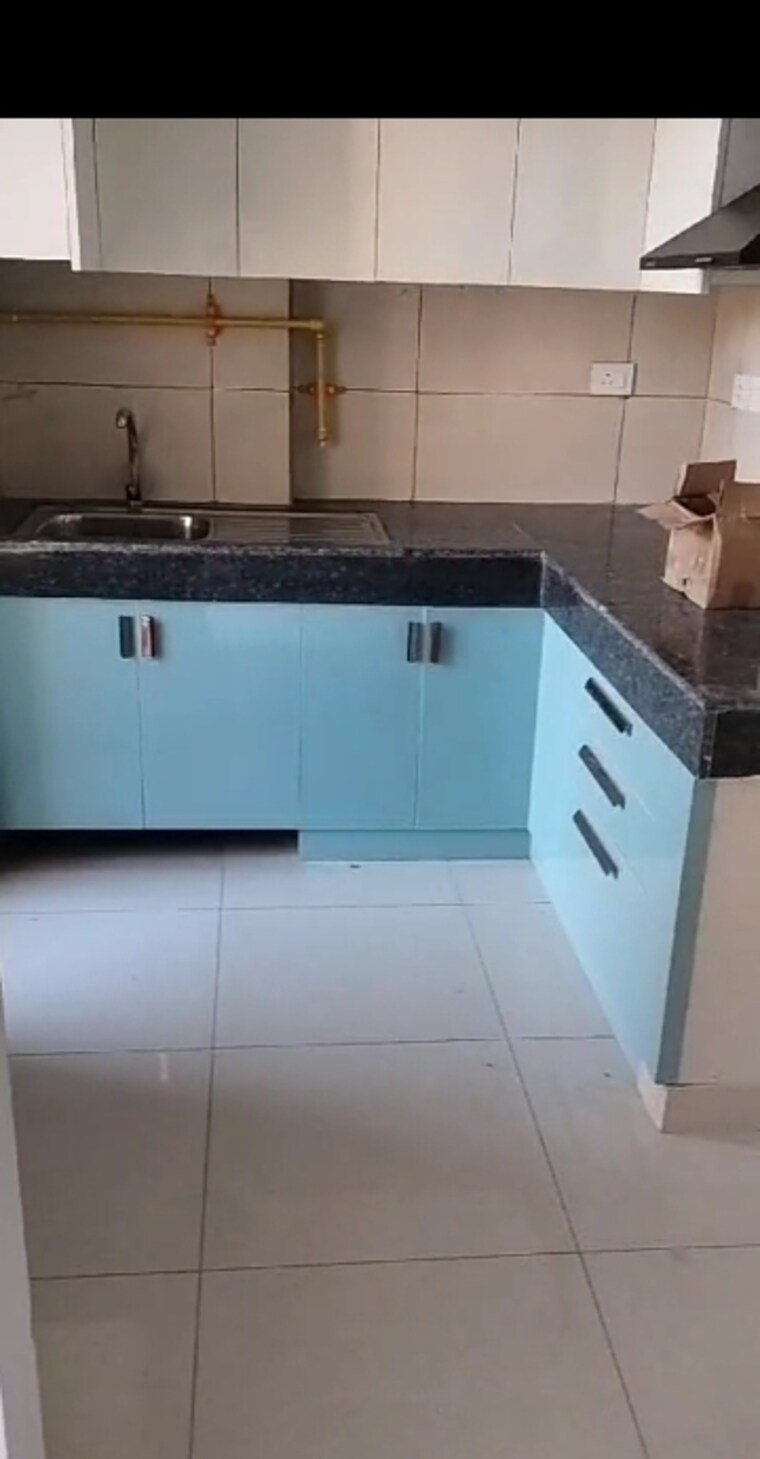 Kitchen, eldeco-live-by-the-greens 2 Bedroom 1137 Sq.Ft. Apartment In Sector 150 Noida 8519485