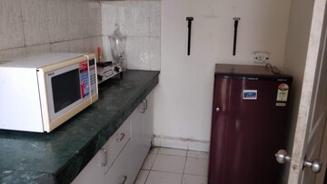 Kitchen in 2.5 BHK Apartment at Paras Tierea, Sector 137 – for Rent