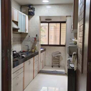 Kitchen in 2 BHK Apartment at K Raheja Palm Court, Malad West – for Rent