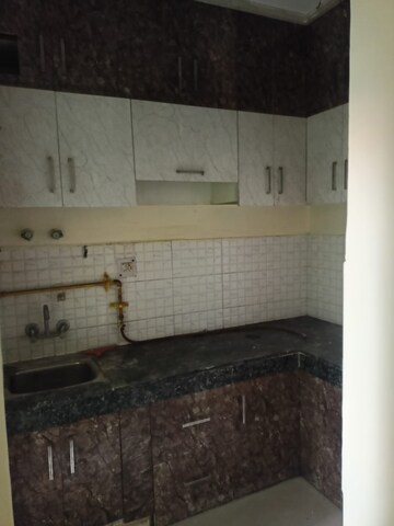 Kitchen in 2 BHK Apartment at Omkar Royal Nest, Tech Zone 4 Greater Noida – for Rent