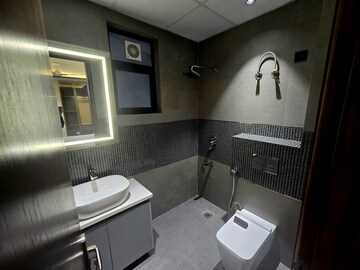 Bathroom in 4 BHK Builder Floor at Ansal API Esencia, Sector 67 – for Sale