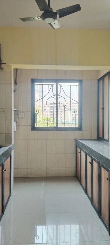 Kitchen in 2 BHK Apartment at Laxmi Royal Classic, Mulund West – for Rent