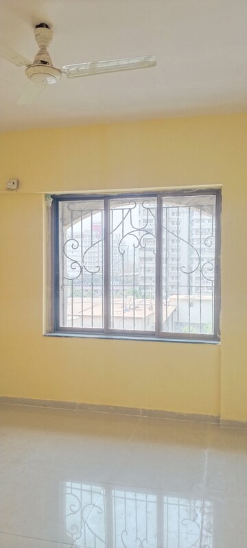 Bedroom in 2 BHK Apartment at Laxmi Royal Classic, Mulund West – for Rent