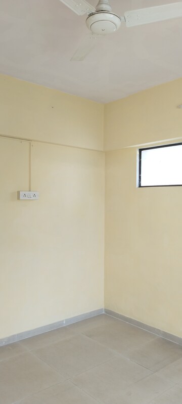 Bedroom in 2 BHK Apartment at Laxmi Royal Classic, Mulund West – for Rent