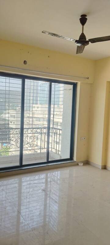 Master Bedroom in 2 BHK Apartment at Laxmi Royal Classic, Mulund West – for Rent