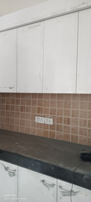 Kitchen in 3 BHK Apartment at Mahagun Mywoods II, Sector 16c Greater Noida – for Sale