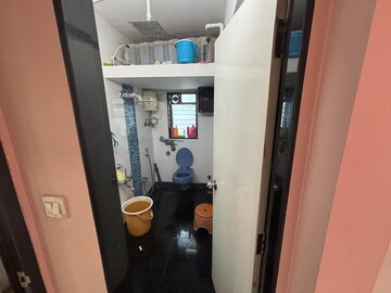 Bathroom in 2.5 BHK Apartment at Aims Golf City, Sector 75 – for Sale