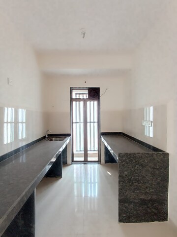 Kitchen in 2 BHK Apartment at Runwal My City, Dombivli East – for Rent