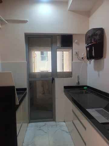 Kitchen in 1 BHK Apartment at Dynamix Avanya, Dahisar East – for Rent