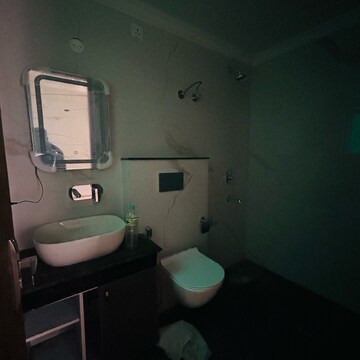 Bathroom in 3 BHK Apartment at Sunny Enclave – for Rent