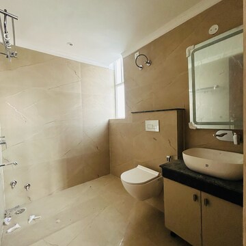 Bathroom in 3 BHK Apartment at Sunny Enclave – for Rent