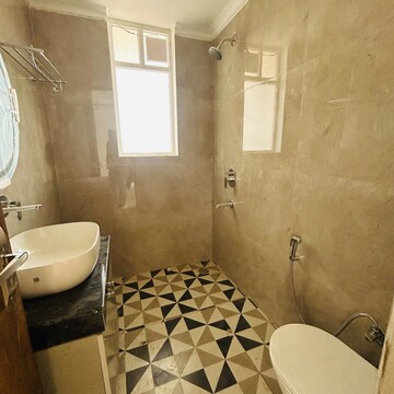 Bathroom in 3 BHK Apartment at Sunny Enclave – for Rent