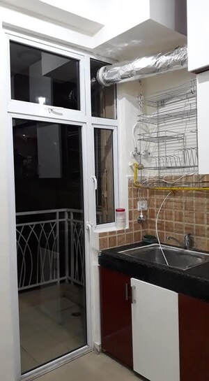 Kitchen in 2 BHK Apartment at Mahagun Mywoods, Sector 16c Greater Noida – for Sale