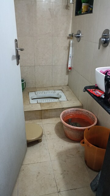 Bathroom in 1 BHK Apartment at Pranjee Garden City Phase 2, Katrap – for Rent