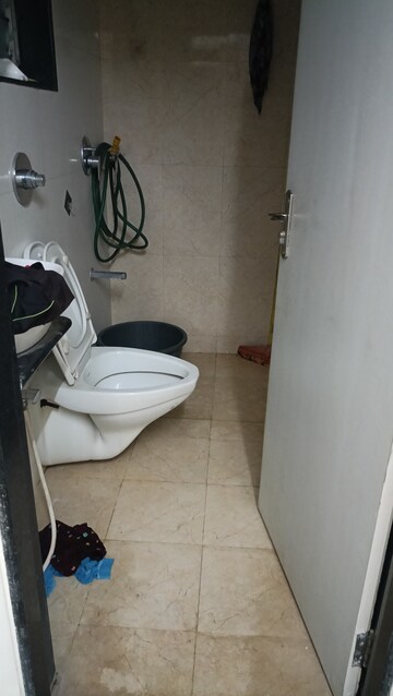 Bathroom in 1 BHK Apartment at Pranjee Garden City Phase 2, Katrap – for Rent