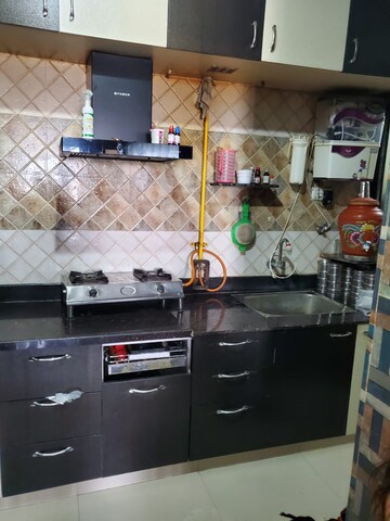 Kitchen in 3 BHK Apartment at Nava Naroda – for Sale