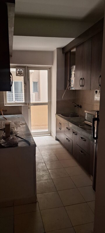 Kitchen in 3.5 BHK Apartment at Logix Blossom County, Sector 137 – for Rent