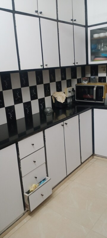 Kitchen in 2 BHK Apartment at Poonam Jewel, Poonam Nagar – for Rent