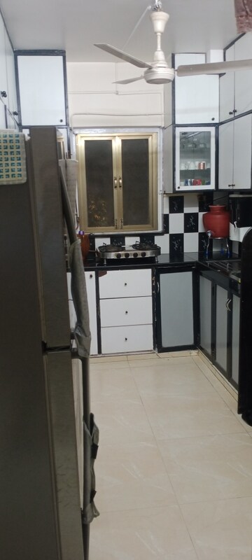 Kitchen in 2 BHK Apartment at Poonam Jewel, Poonam Nagar – for Rent