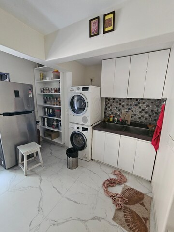 Kitchen in 4 BHK Apartment at Lokhandwala Complex Andheri – for Sale