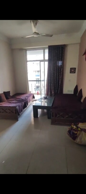 Living Room in 2 BHK Apartment at Mahagun Mascot, Sain Vihar – for Sale