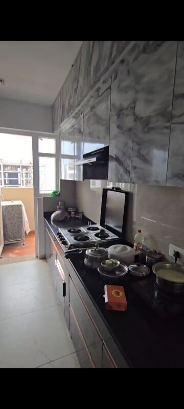 Kitchen in 3 BHK Apartment at Rishita Manhattan, Gomti Nagar – for Rent