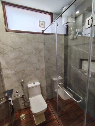 Bathroom in 3 BHK Apartment at Chittaranjan Park – for Rent