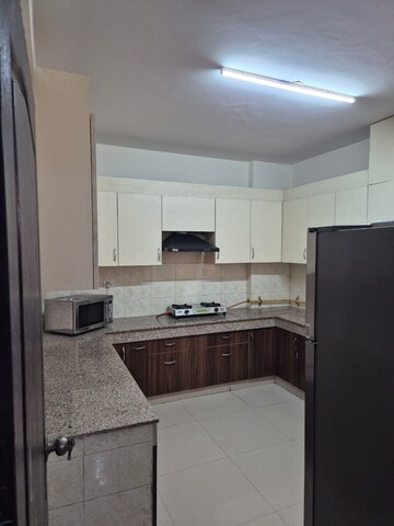 Kitchen in 4 BHK Apartment at Logix Blossom County, Sector 137 – for Rent