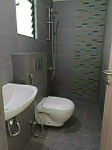 Bathroom in 2 BHK Apartment at Magarpatta Riverview City Hornbill Heights, Loni Kalbhor – for Sale