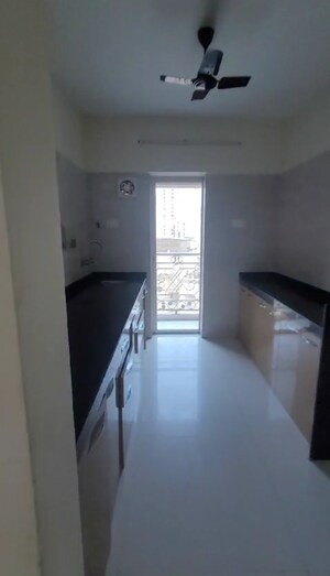 Kitchen in 2 BHK Apartment at Rosa Oasis, Ghodbunder Road – for Sale