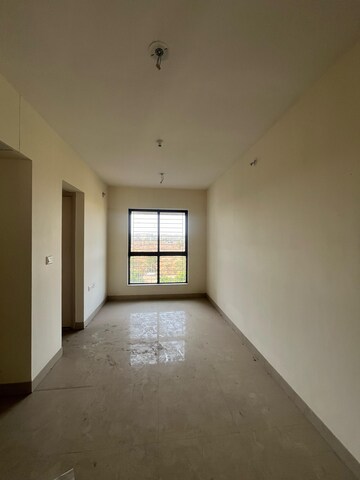 Living Room in 1 BHK Apartment at Lodha Crown Quality Homes Dombivli, Dombivli East – for Rent