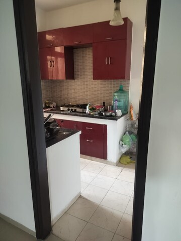 Kitchen in 2 BHK Apartment at Omaxe Palm Greens, Mu Greater Noida – for Rent
