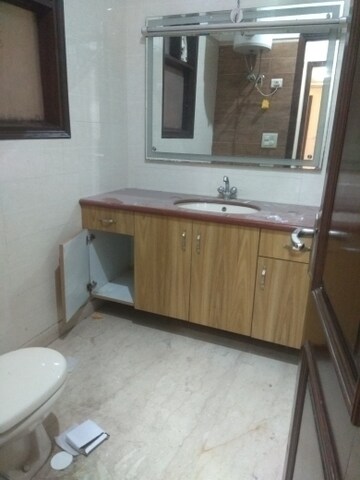 Bathroom in 4 BHK Builder Floor at New Friends Colony – for Rent