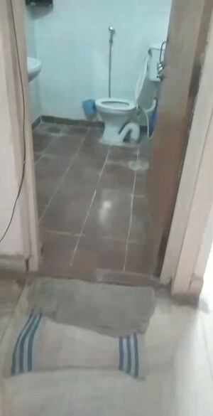 Bathroom in 4 BHK Builder Floor at Raj Nagar Extension – for Sale