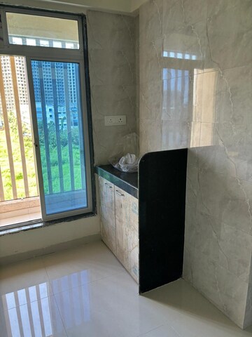 Kitchen in 1 BHK Apartment at Vinay Unique Avenue 210, Nalasopara West – for Sale