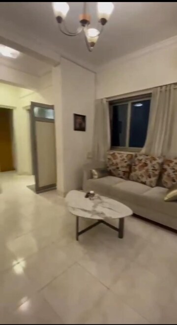 Living Room in 2 BHK Apartment at Homeland Apartment, Andheri West – for Rent