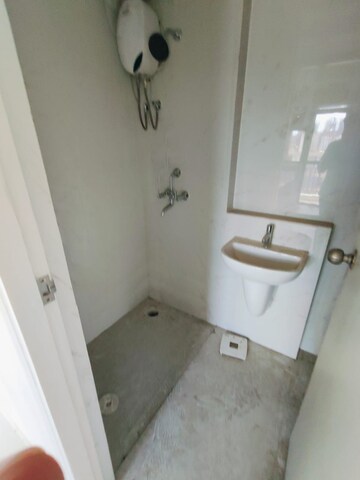 Bathroom in 1.5 BHK Apartment at Runwal Gardens, Dombivli East – for Rent