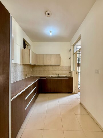Kitchen in 3 BHK Apartment at Sushma Elite Cross, Dhakoli Village – for Sale