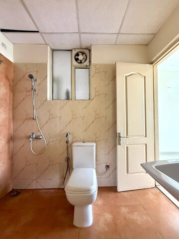 Bathroom in 3 BHK Apartment at Sushma Elite Cross, Dhakoli Village – for Sale